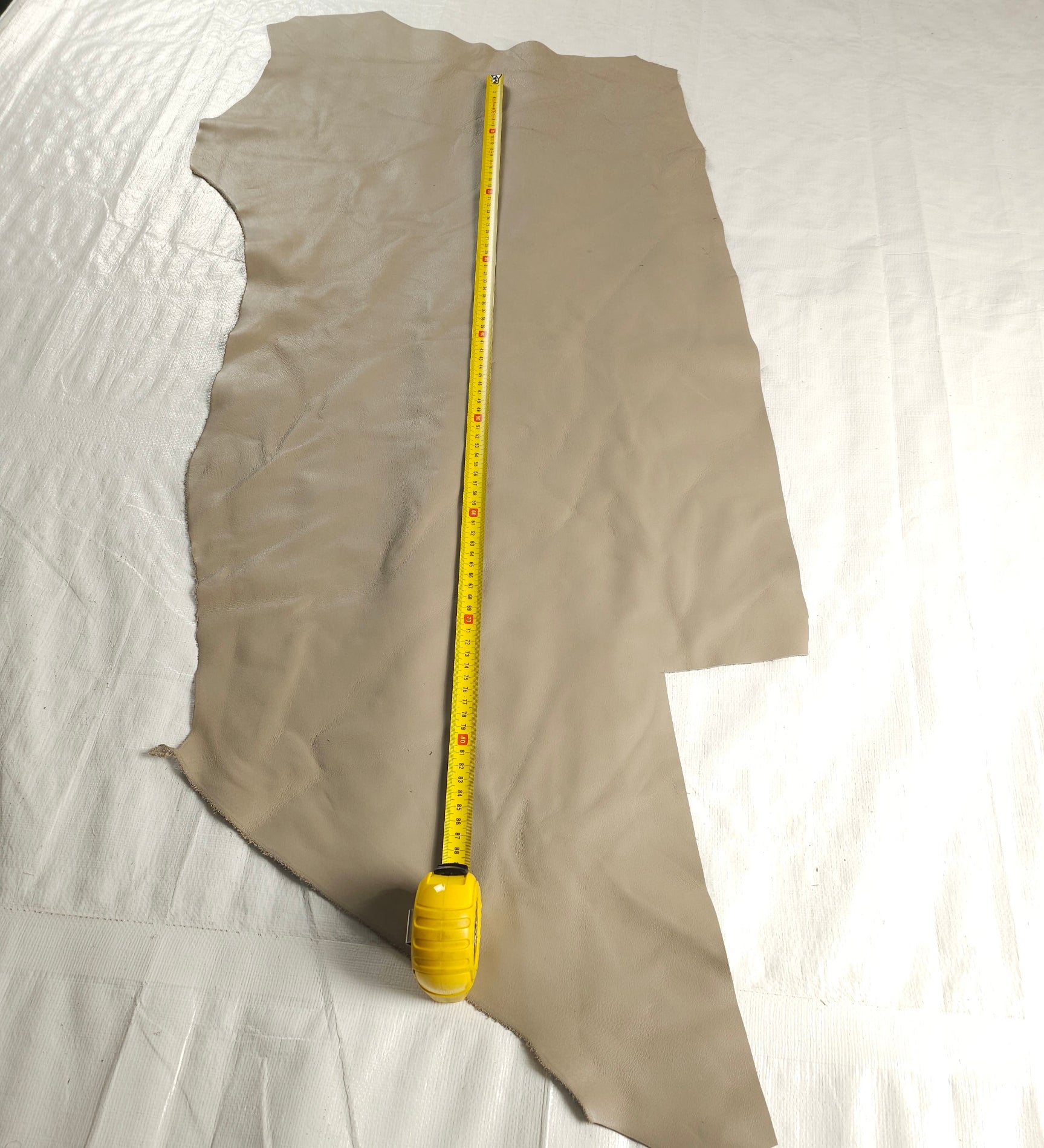 Large stone beige leather scraps, 3-5 sq. ft, showing a smooth surface.