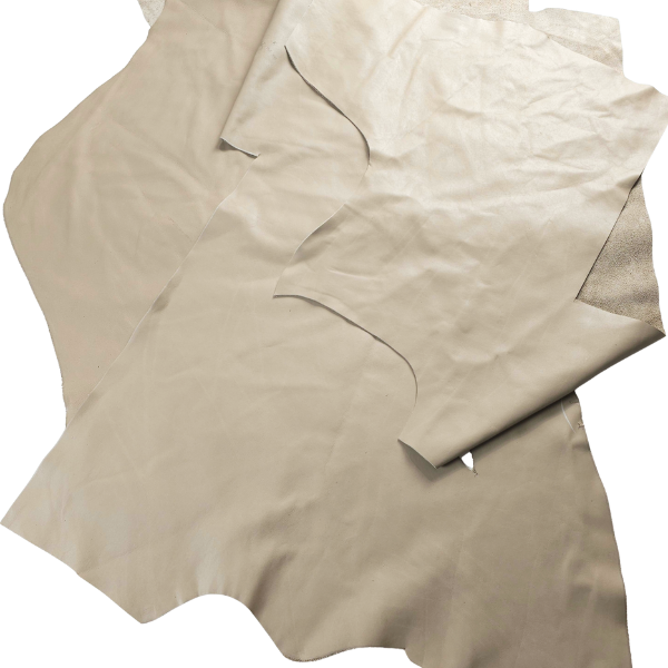 Large stone beige leather scraps in various sizes, showcasing natural texture and color variations.