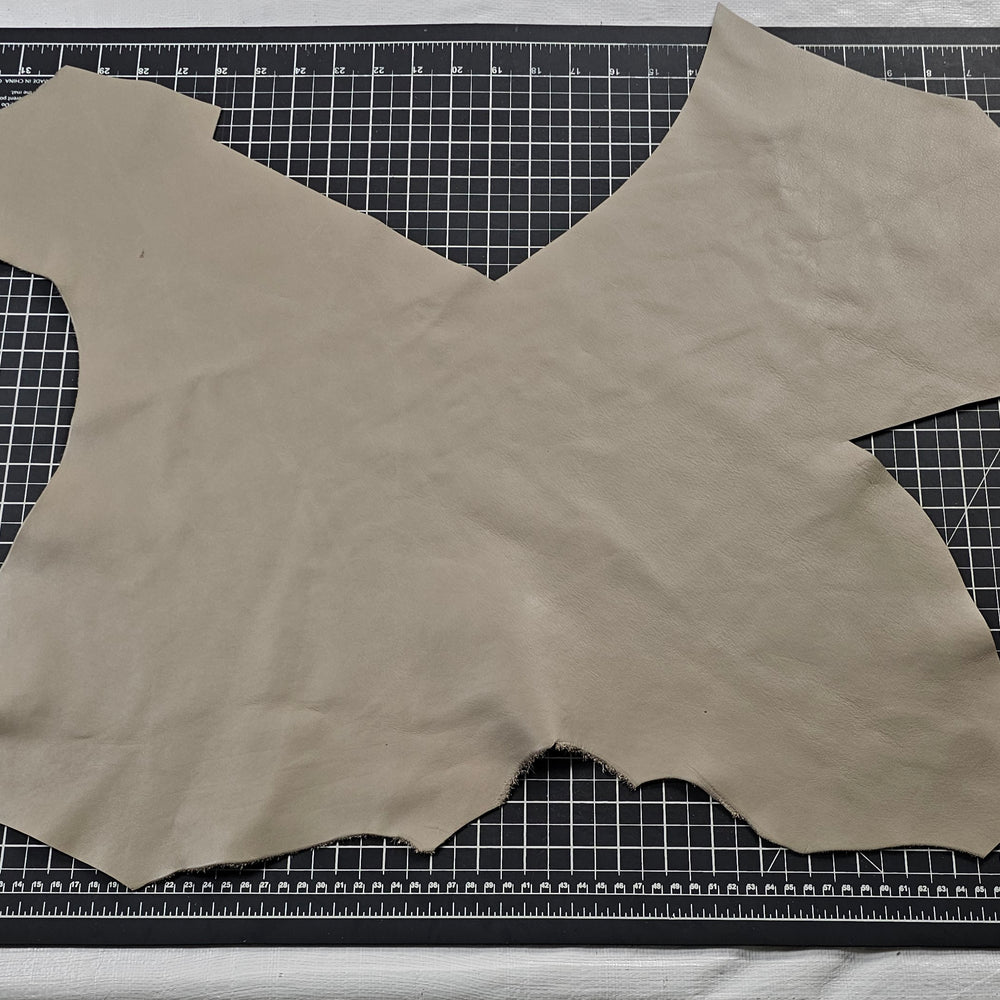 Assorted beige cowhide leather pieces 1–2 sq ft