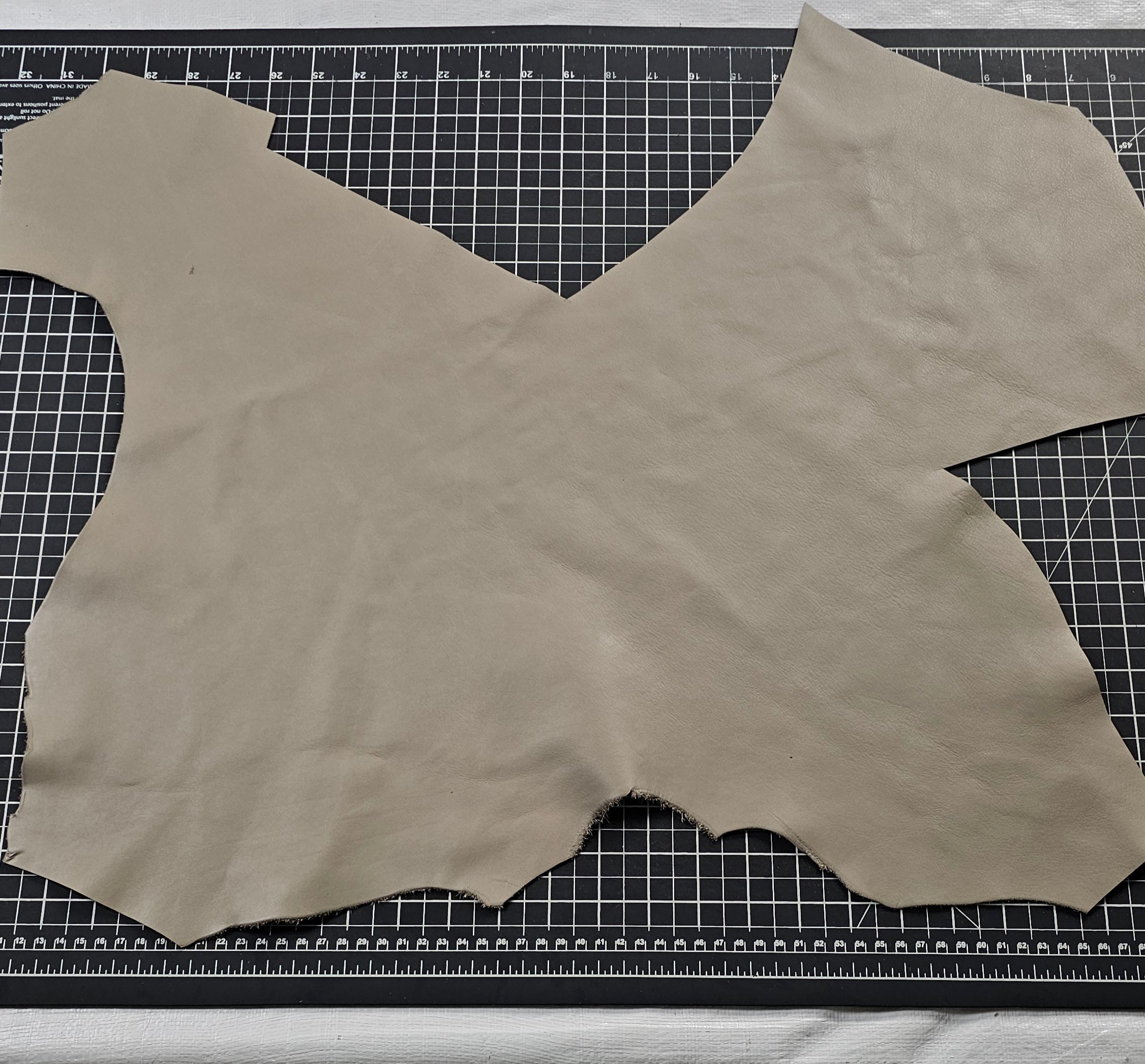 Assorted beige cowhide leather pieces 1–2 sq ft