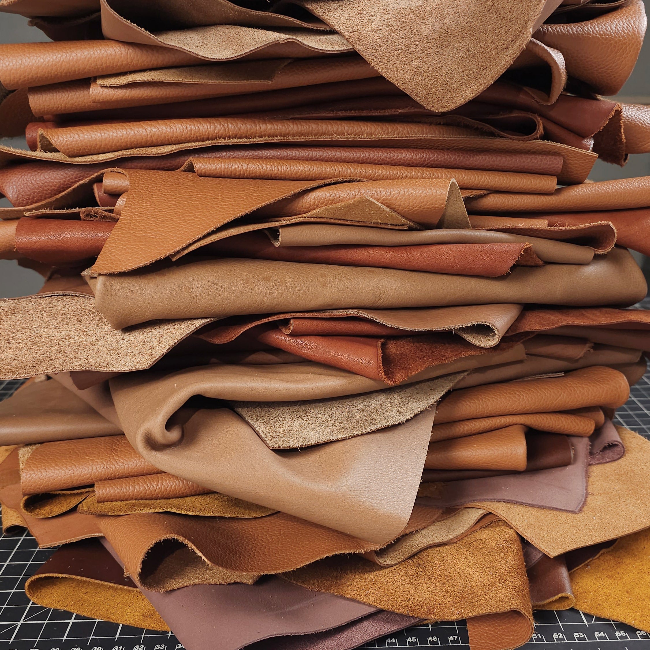 Assorted brown leather scraps 1 to 2 sq ft