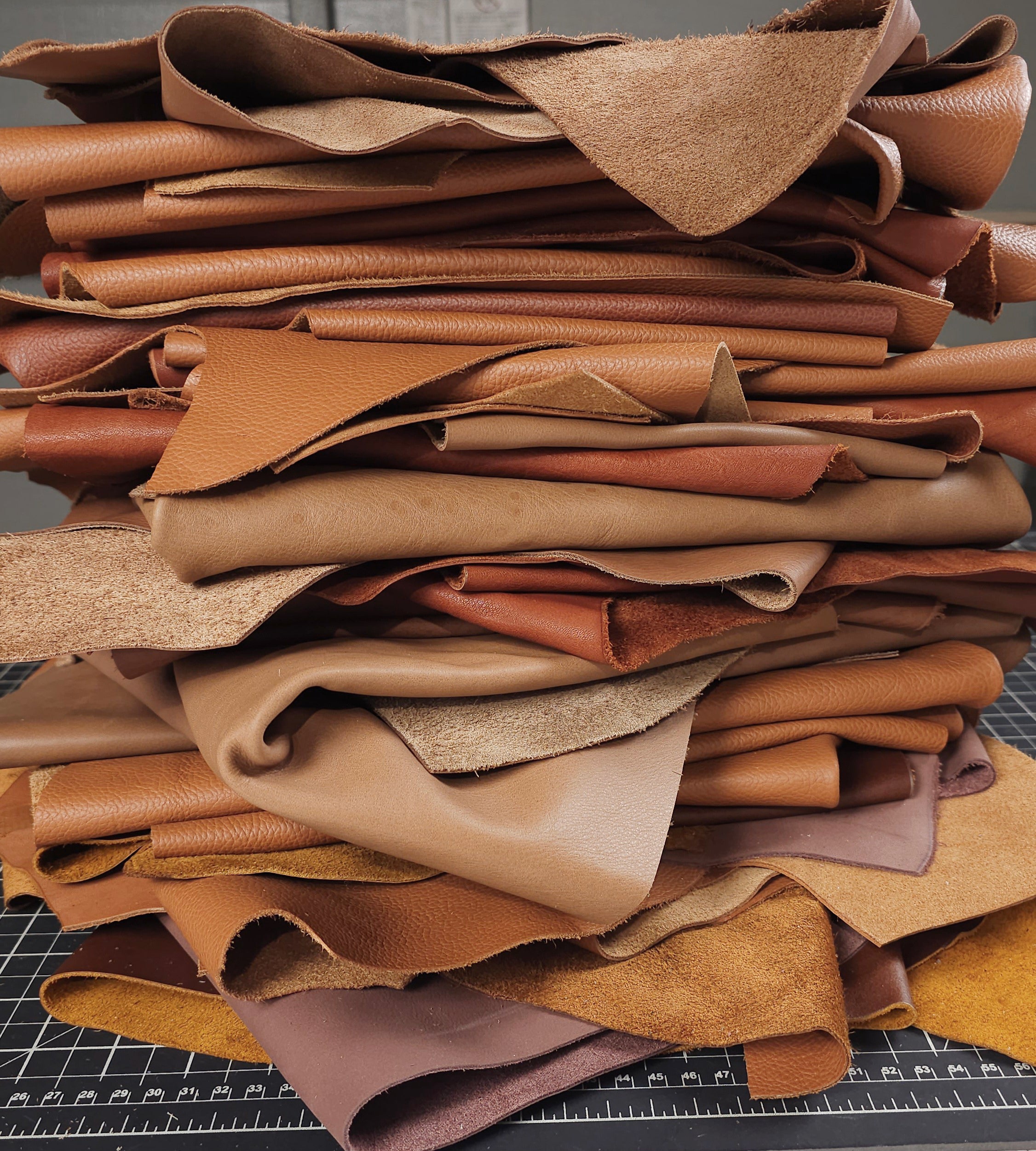 Assorted brown leather scraps 1 to 2 sq ft