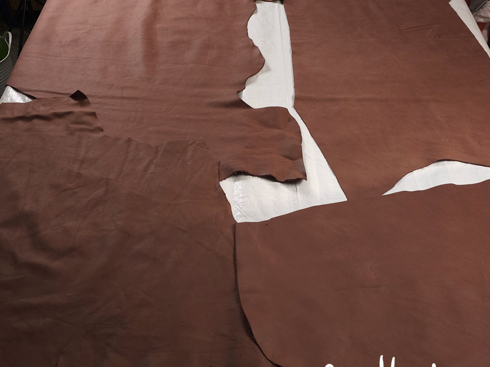 Full-grain semi-aniline leather offcuts in various colours for DIY crafts