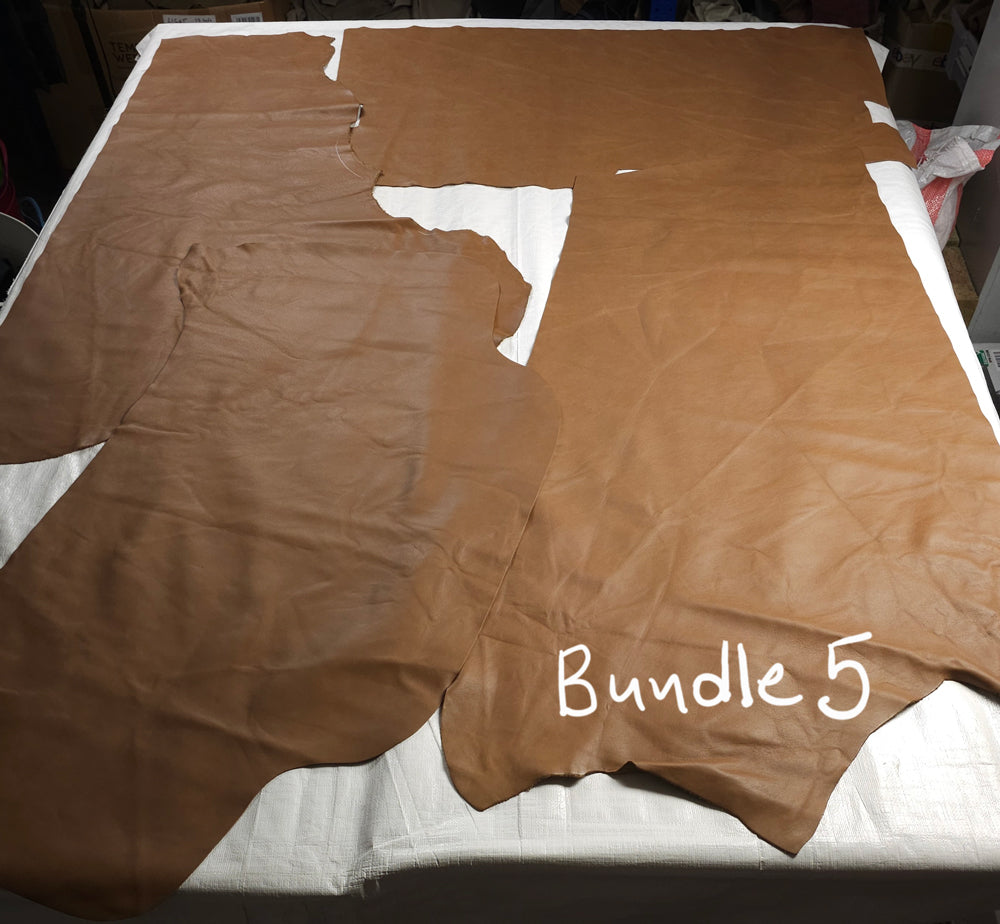 Bundle of brown leather remnants ideal for DIY projects