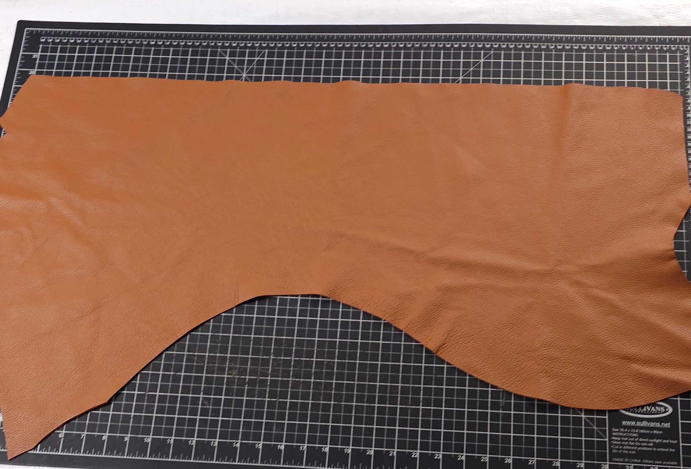 Caramel tan chocolate almond red brown leather pieces