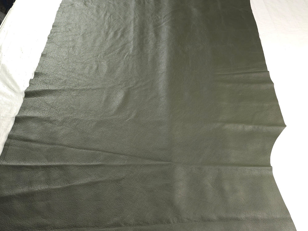 Dark olive corrected grain cowhide hide with smooth, uniform texture