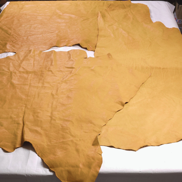 Full grain saddle tan leather offcuts