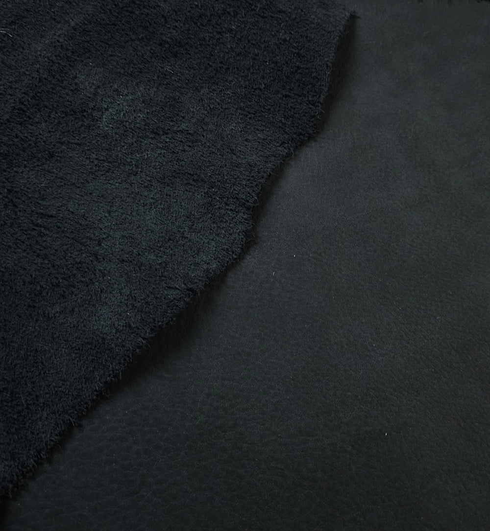 Semi-aniline leather piece showcasing natural grain and flexibility