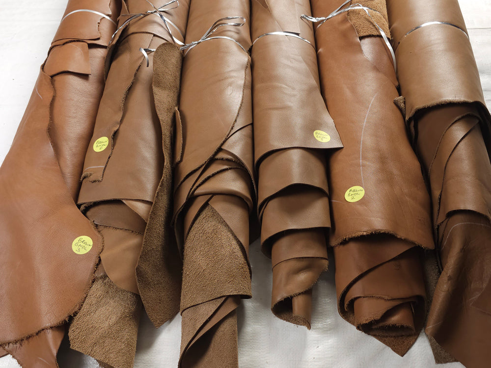 Bundle of large brown cowhide remnants ideal for DIY projects