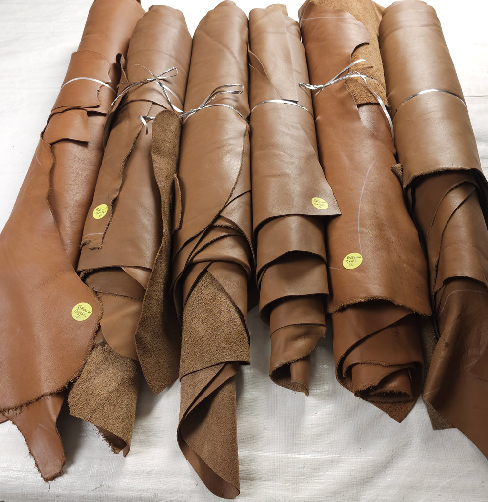 Bundle of large brown cowhide remnants ideal for DIY projects