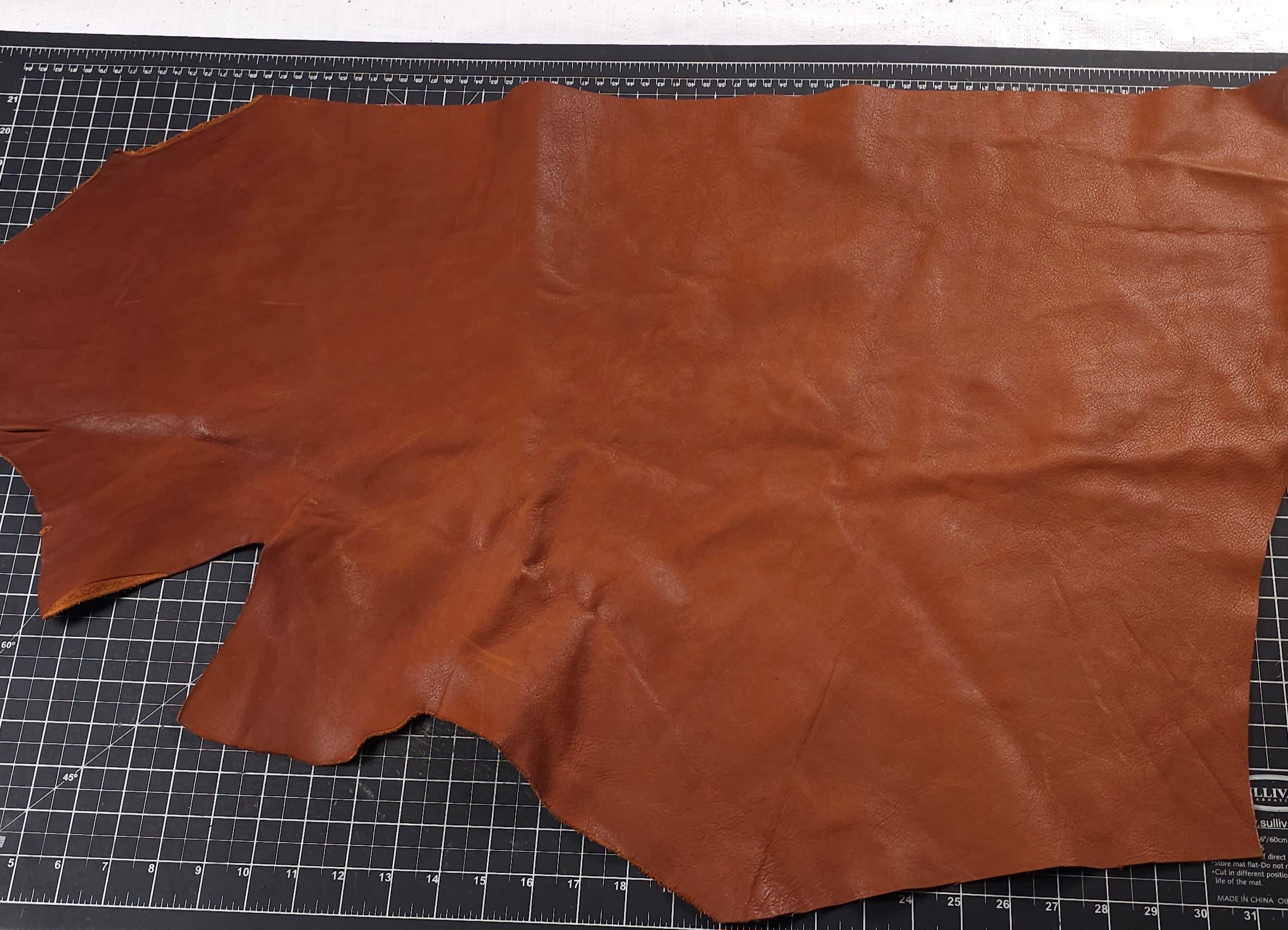 Medium assorted brown leather offcuts full grain
