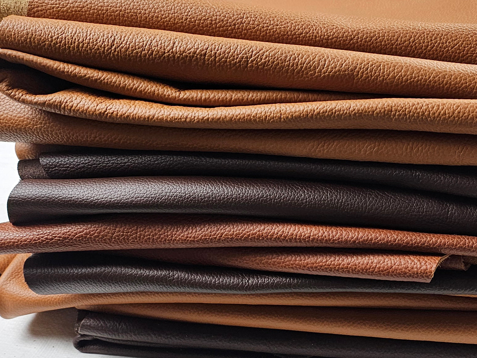 Upholstery leather scraps 1-2 sq. ft - Assorted Brown