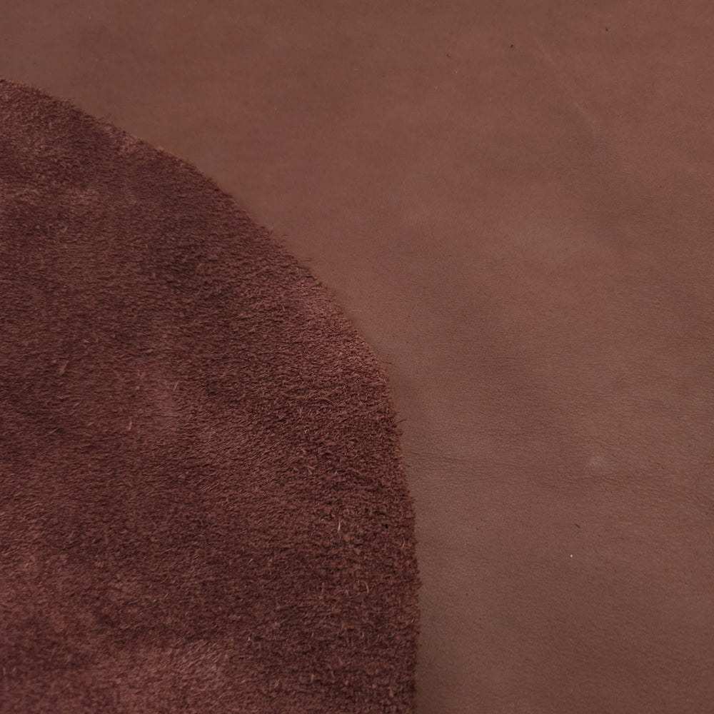 Close-up of reddish leather bundle 