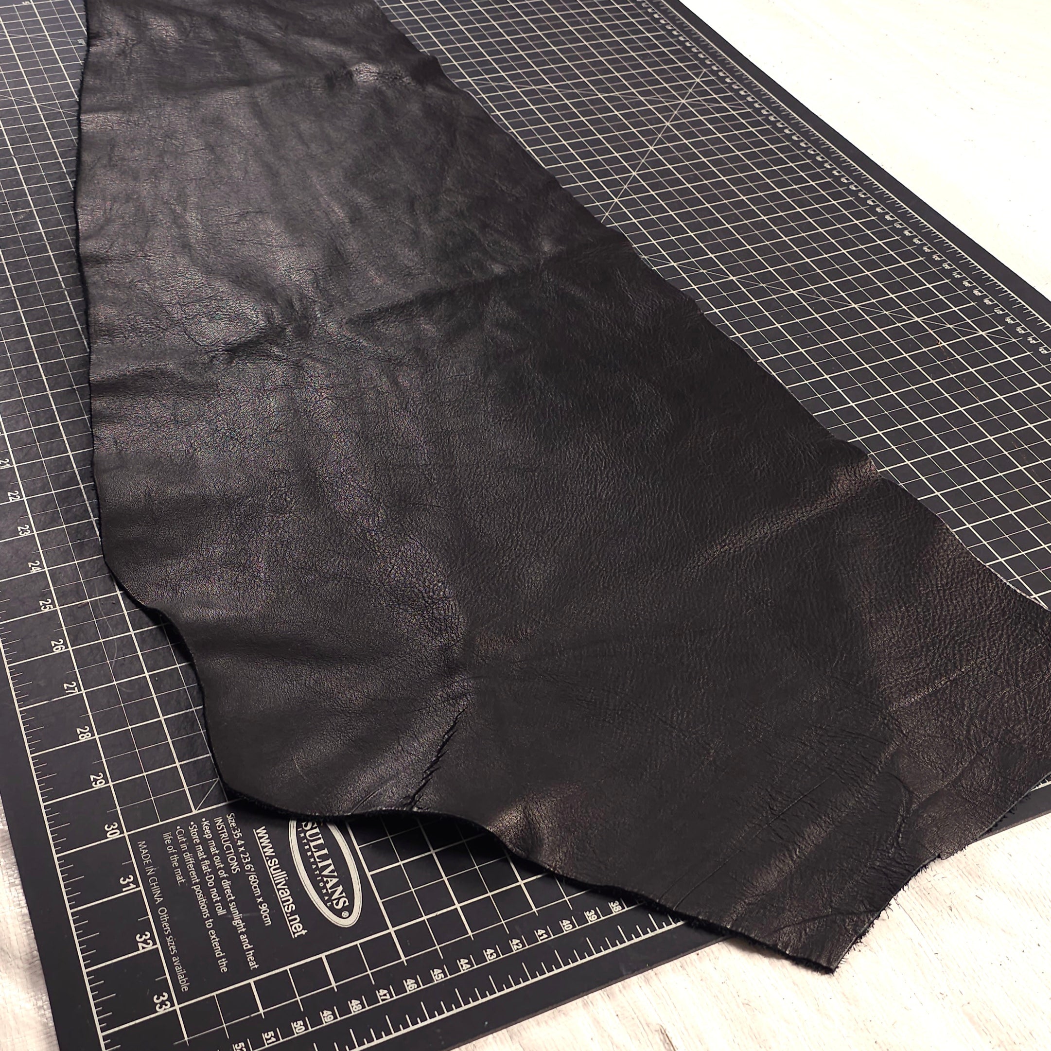 semi-aniline black leather pieces