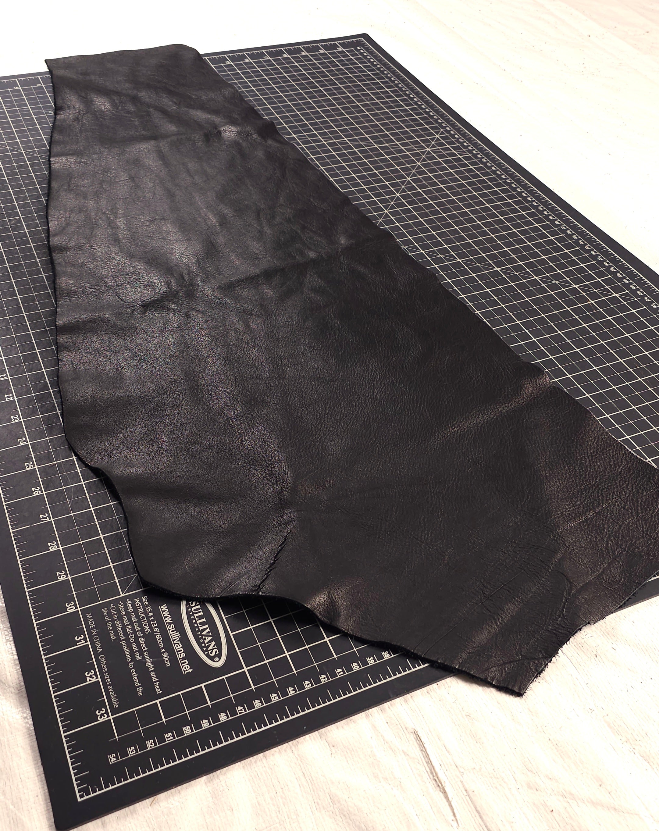 semi-aniline black leather pieces