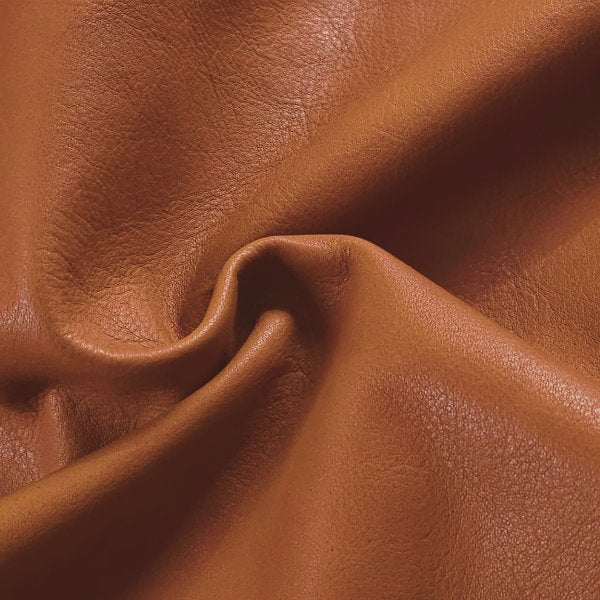 Tan Veg-Tan Leather Cut, showing flexibility