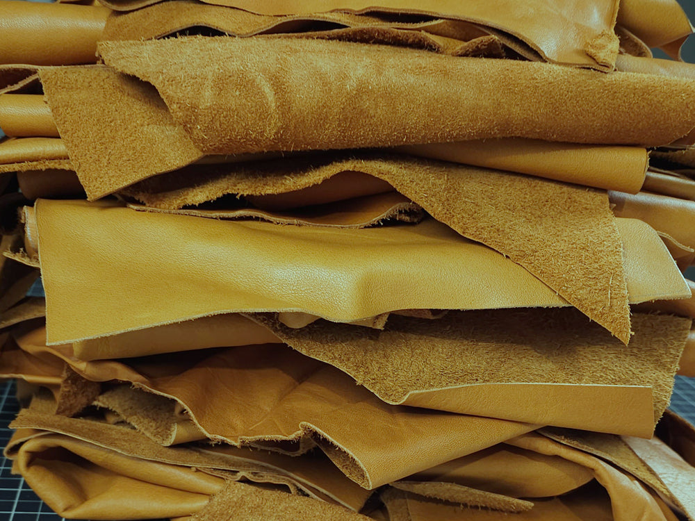 Full-grain vegetable tanned leather scraps in assorted colours, ideal for crafting