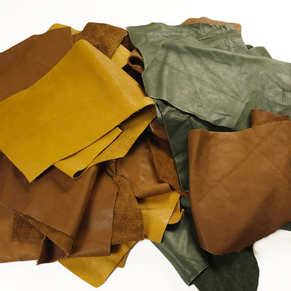 Full-grain vegetable tanned leather scraps in assorted colours, ideal for crafting