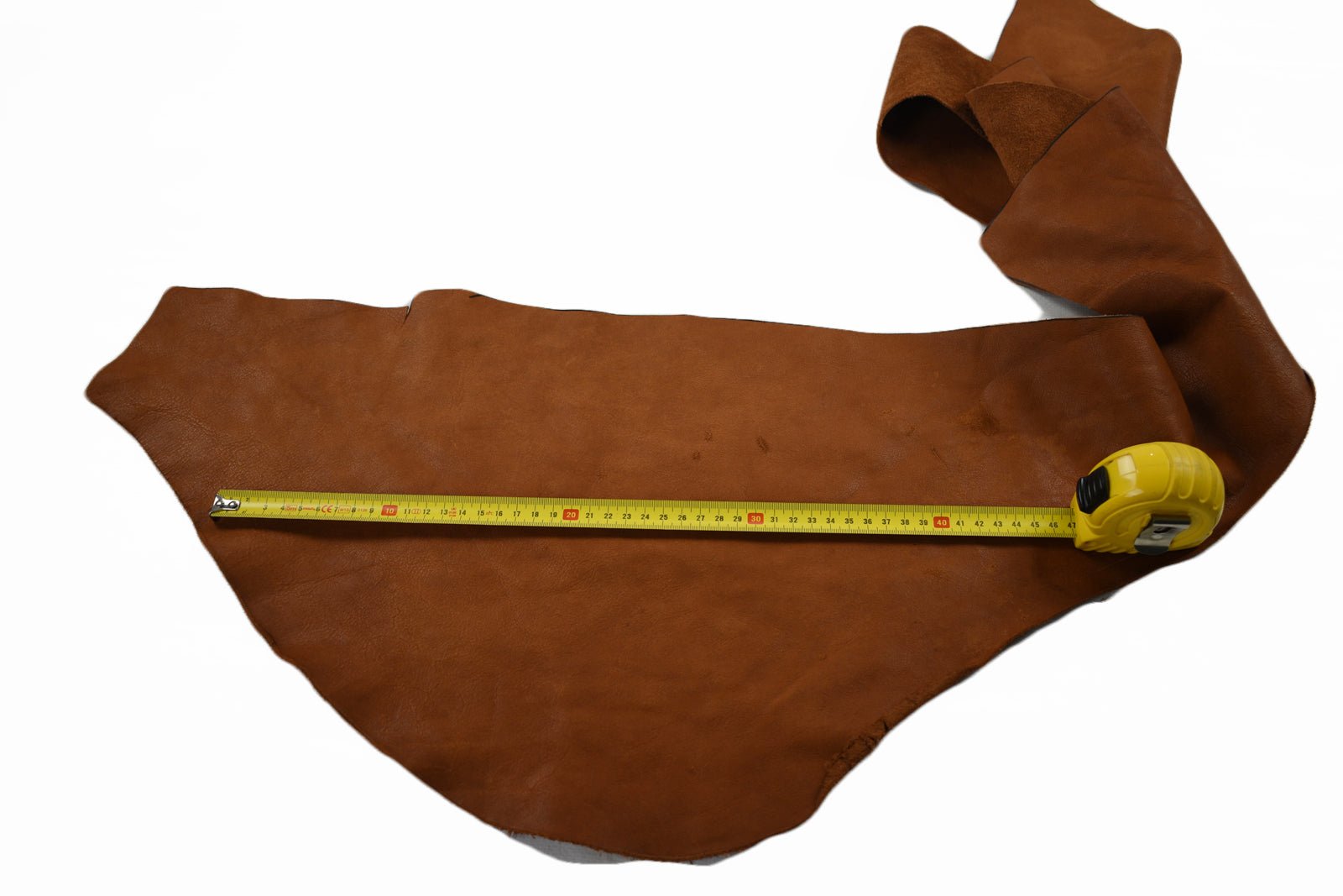 brown cowhide leather piece